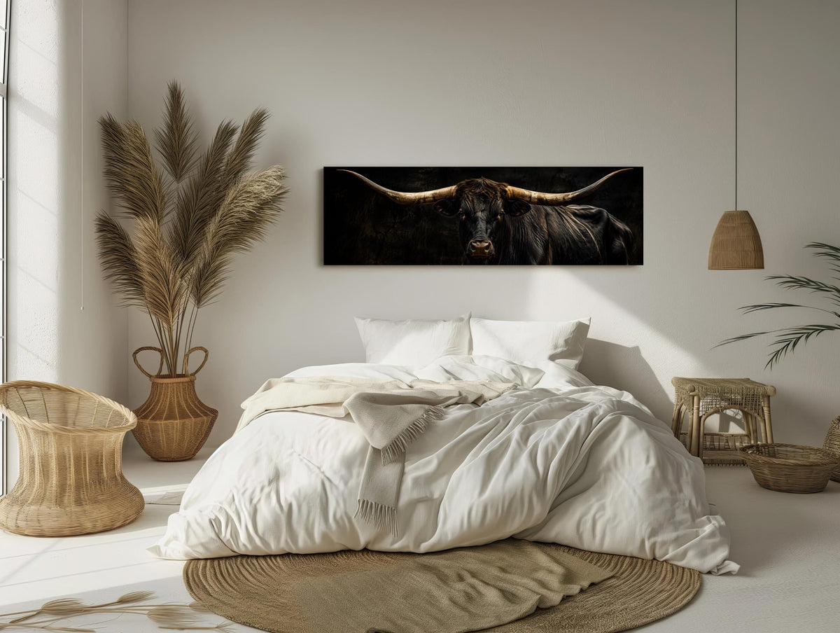 Texas longhorn portrait canvas wall art, serene bedroom scene with a large bed, a potted plant, and a framed image of a