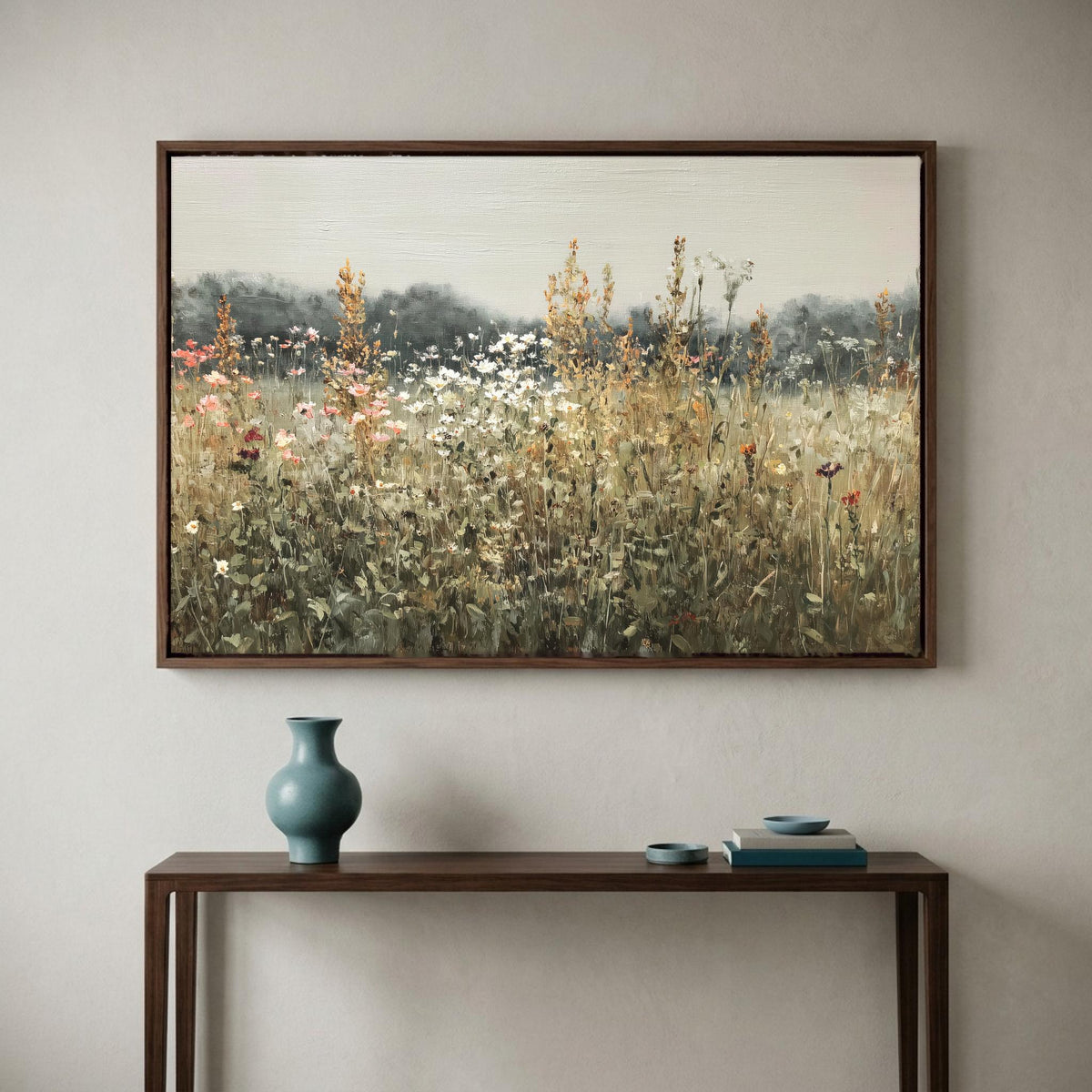 Sage wildflower meadow canvas wall art, large painting of a field with tall grass and wildflowers hanging on a wall above a