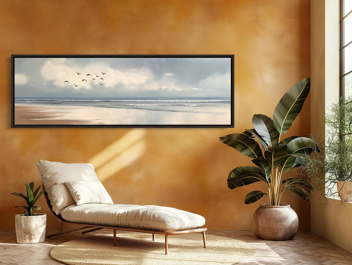 Birds over calm beach canvas wall art, living room with a chair and a painting on the wall