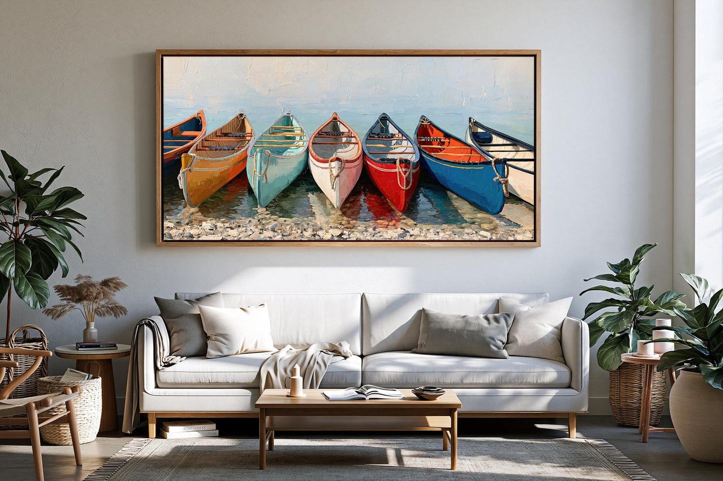 a large painting of colorful canoes lined up on a beach, hanging on a wall above a white sofa in a living room setting.