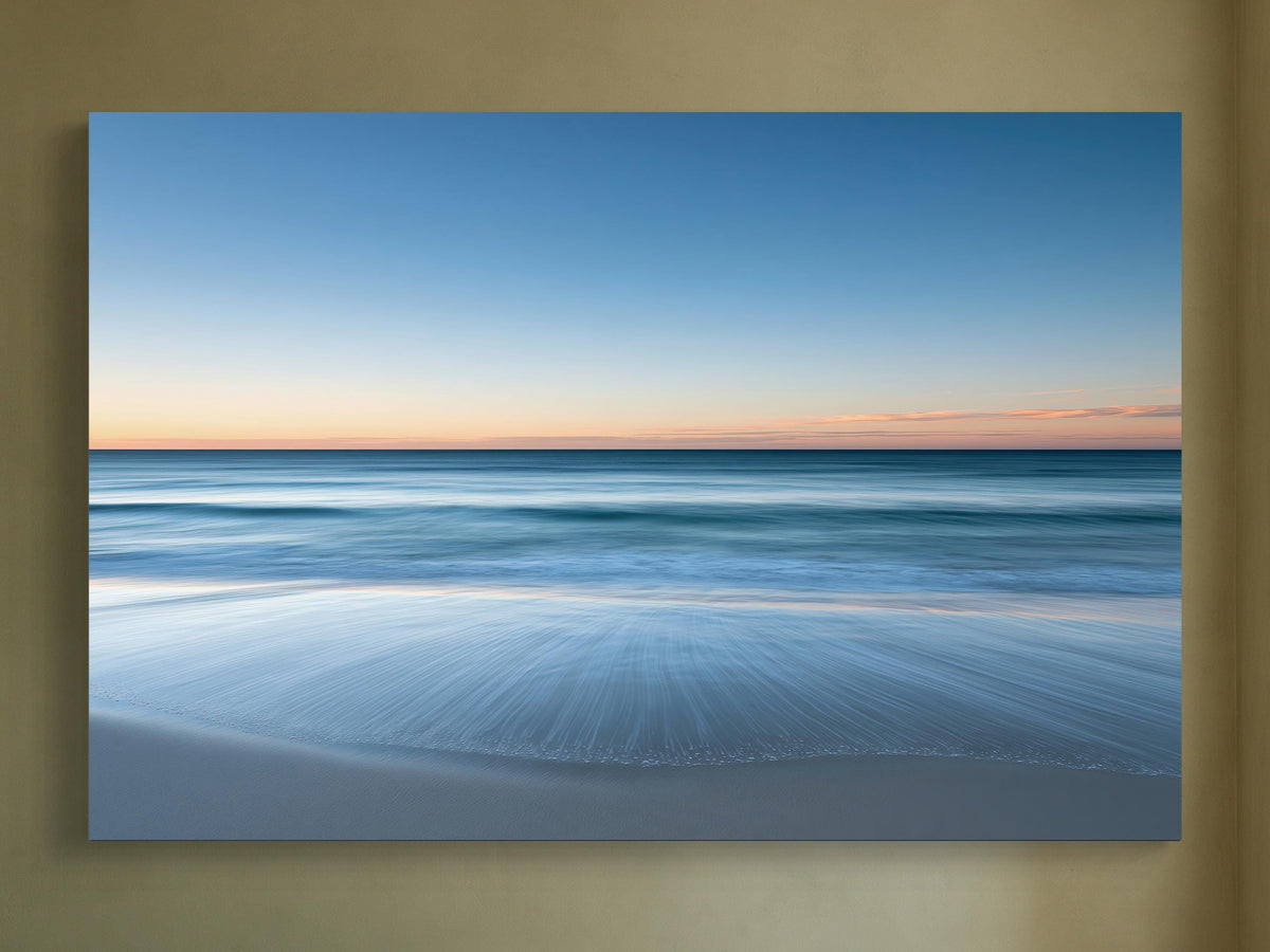 Ocean horizon at dusk canvas wall art, serene beach scene at sunset, with the calm ocean meeting the sky in a beautiful
