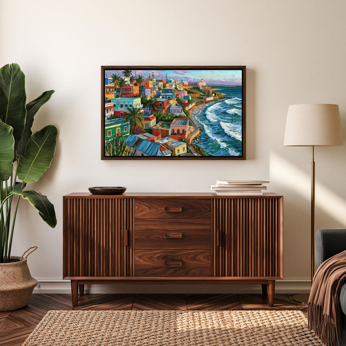 La Perla aerial view canvas wall art, large, colorful painting of a coastal town hanging on a wall above a wooden cabinet or
