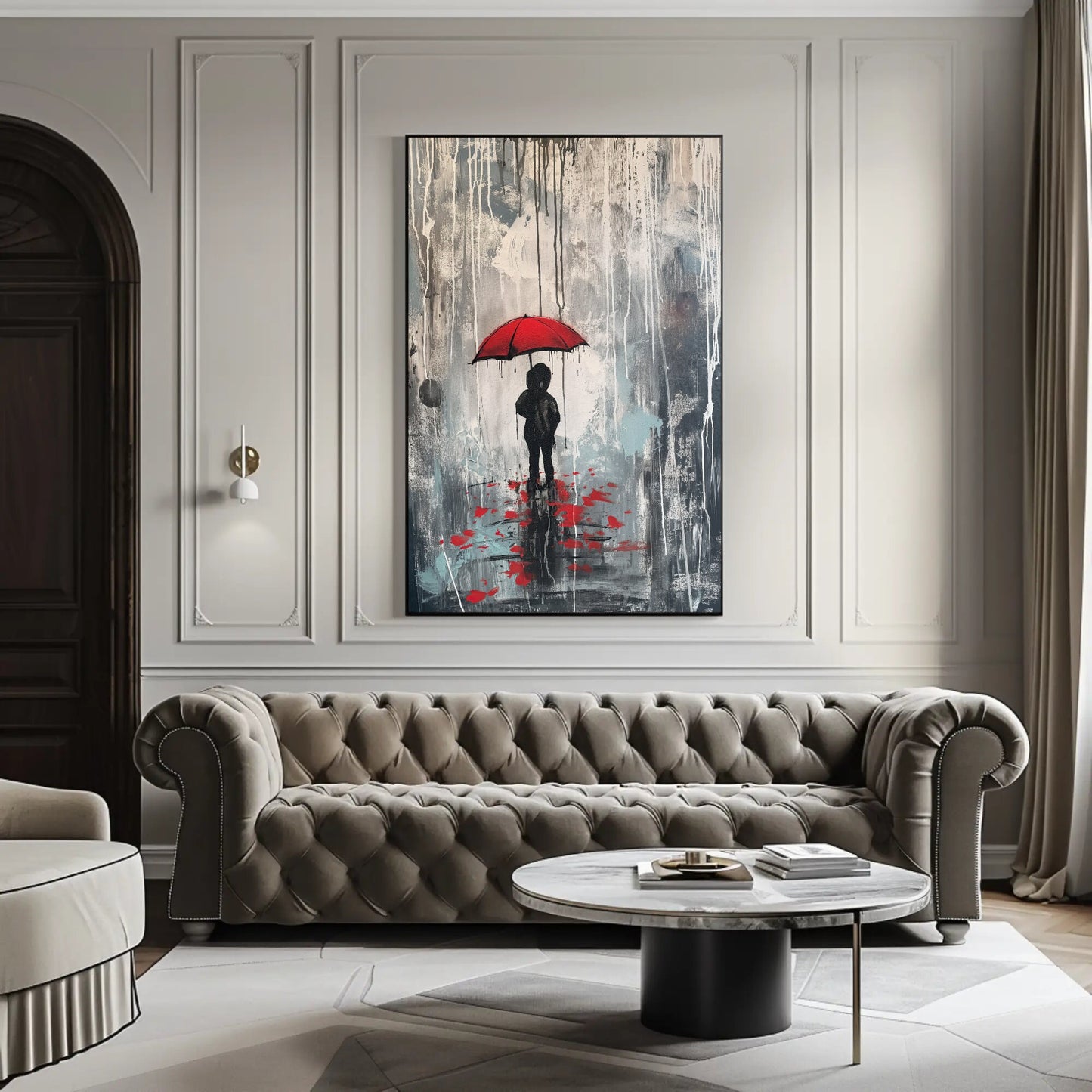 a living room with a couch and a painting on the wall