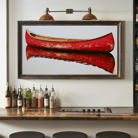 a wooden bar counter with various bottles and a framed picture of a red canoe on the wall above it.