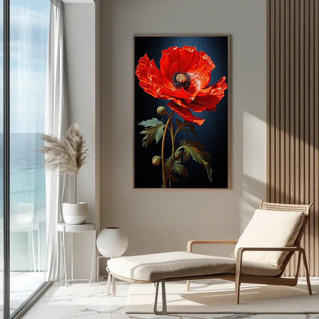 Red poppy on navy canvas wall art, large, vibrant red flower in a black frame, hanging on a wall above a white chair in a