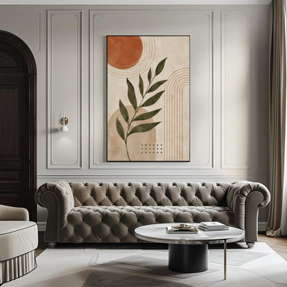 a modern living room with a tufted gray sofa, a round coffee table, and a large abstract painting on the wall.
