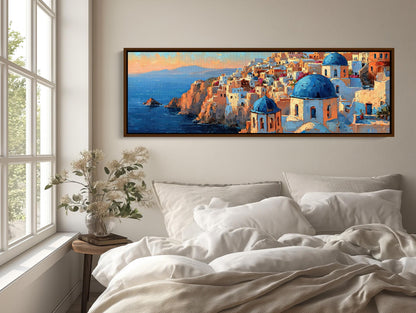 Santorini Cliffside Painting canvas wall art shown above a bed