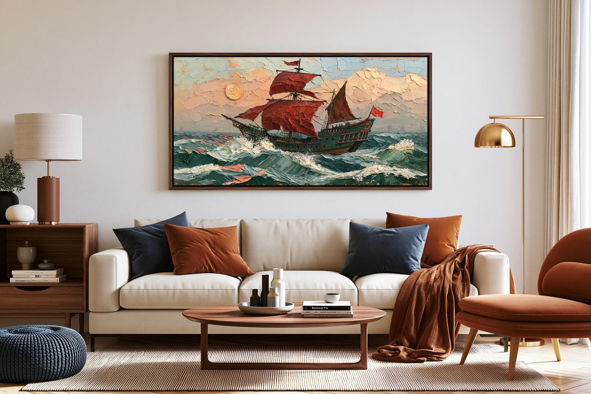 a large painting of a ship sailing on the ocean, hanging on a wall above a white sofa in a living room setting.