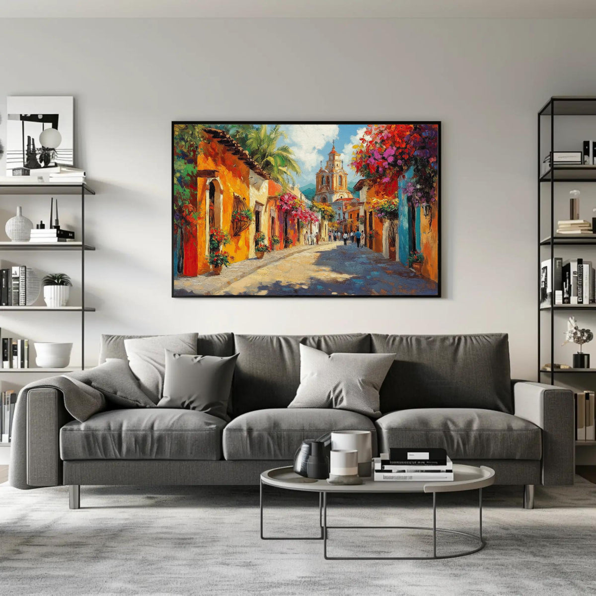 Colorful Mexican street canvas wall art, large, colorful painting of a street scene hanging on a wall above a gray sofa in a