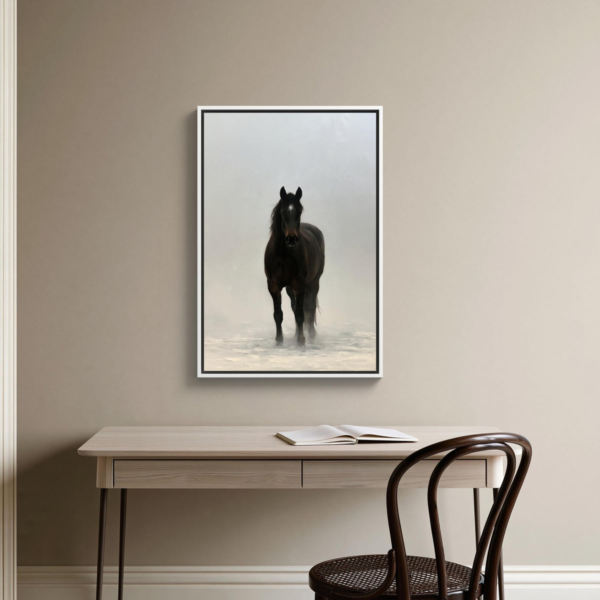 Black horse in mist canvas wall art, black horse standing in a misty, snowy landscape, with a wooden desk and chair in the