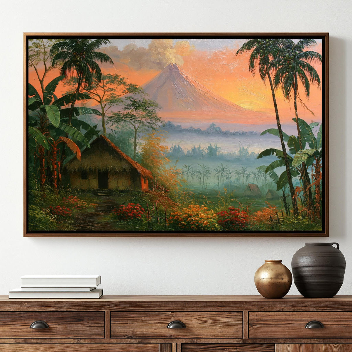 The image is a framed painting depicting a tropical landscape with a large mountain in the background, surrounded by lush vegetation, palm trees, and a hut.