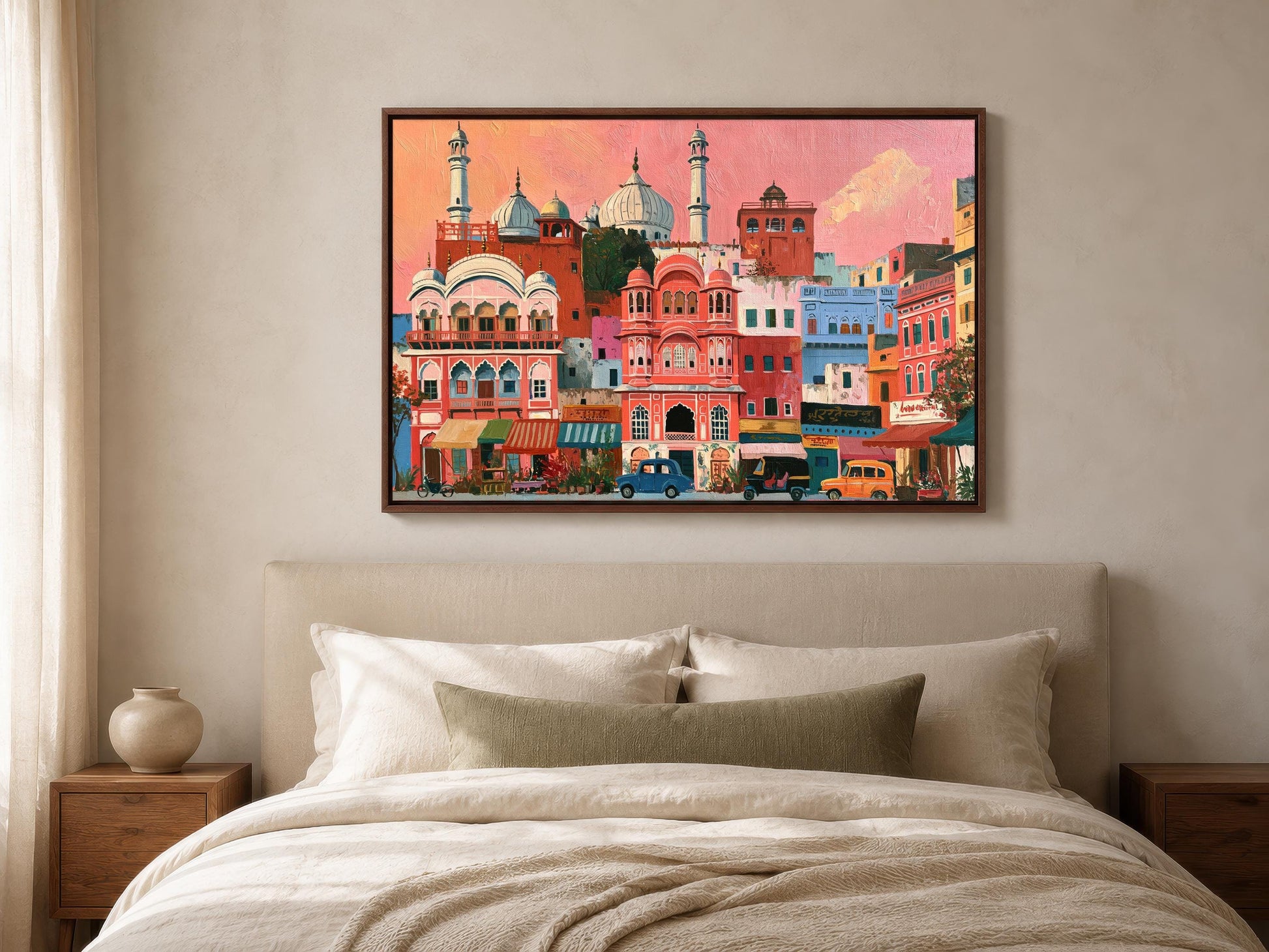 a large, colorful painting of a cityscape hanging on a wall above a bed with white bedding.