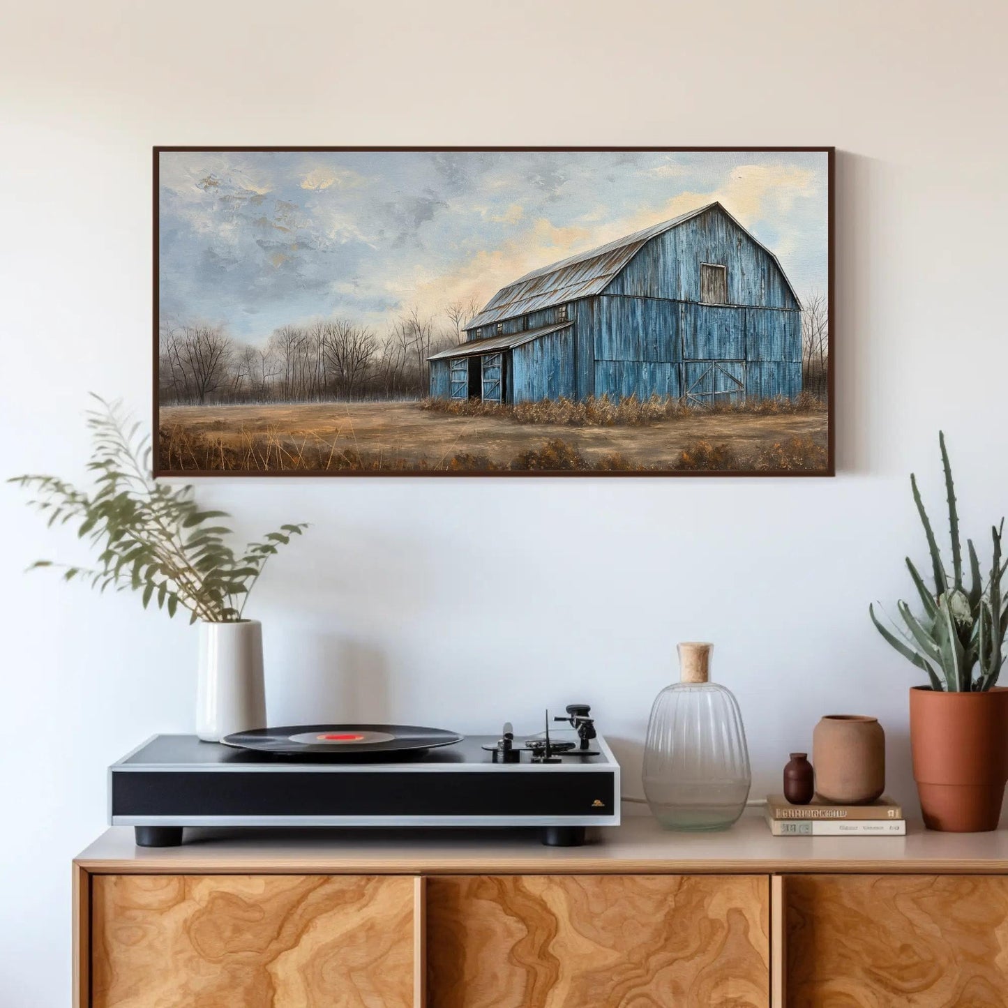 Blue Barn Landscape canvas wall art shown in a styled room