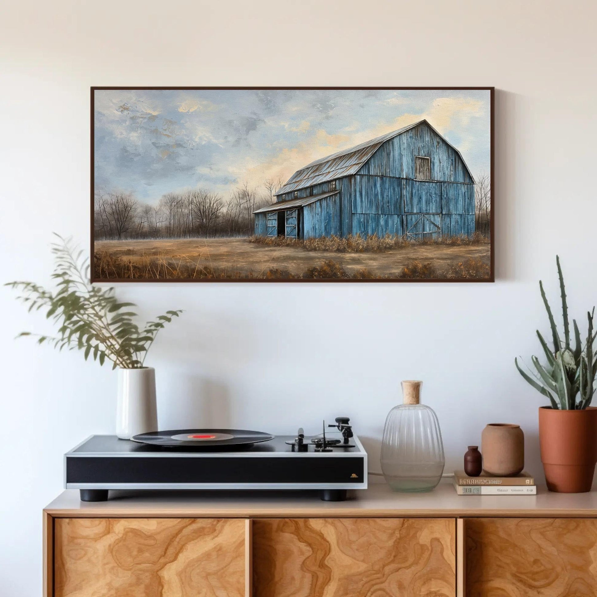 Blue Barn Landscape canvas wall art shown in a styled room