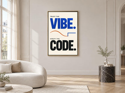 a modern living room with a large poster on the wall that reads "Trust the VIBE. Verify the CODE."