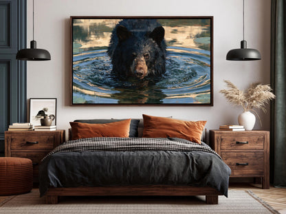 a large black bear swimming in a body of water, with a framed photograph of the bear above a bed in a bedroom setting.