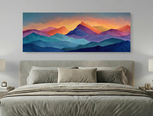 a large, colorful painting of mountains hanging above a bed with a gray headboard.