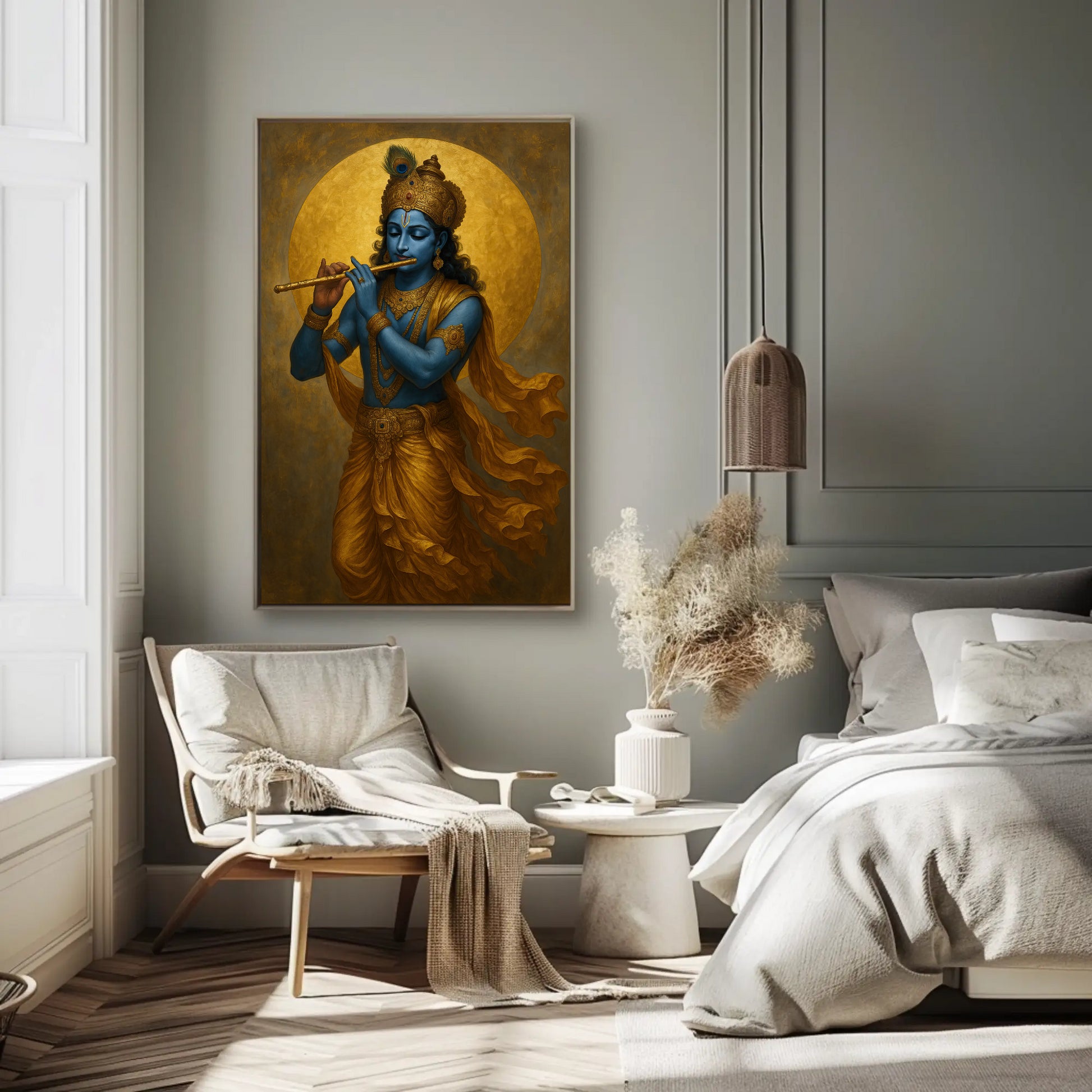 a bedroom with a large painting of a blue-skinned Hindu deity playing a flute on the wall. The room has a white bed, a wooden chair, and a white table with a vase of flowers. The overall decor has a minimalist and modern style.