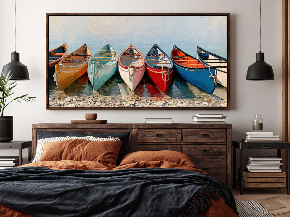 a large painting of six colorful canoes lined up on a beach, with a wooden dresser and nightstand in the foreground.
