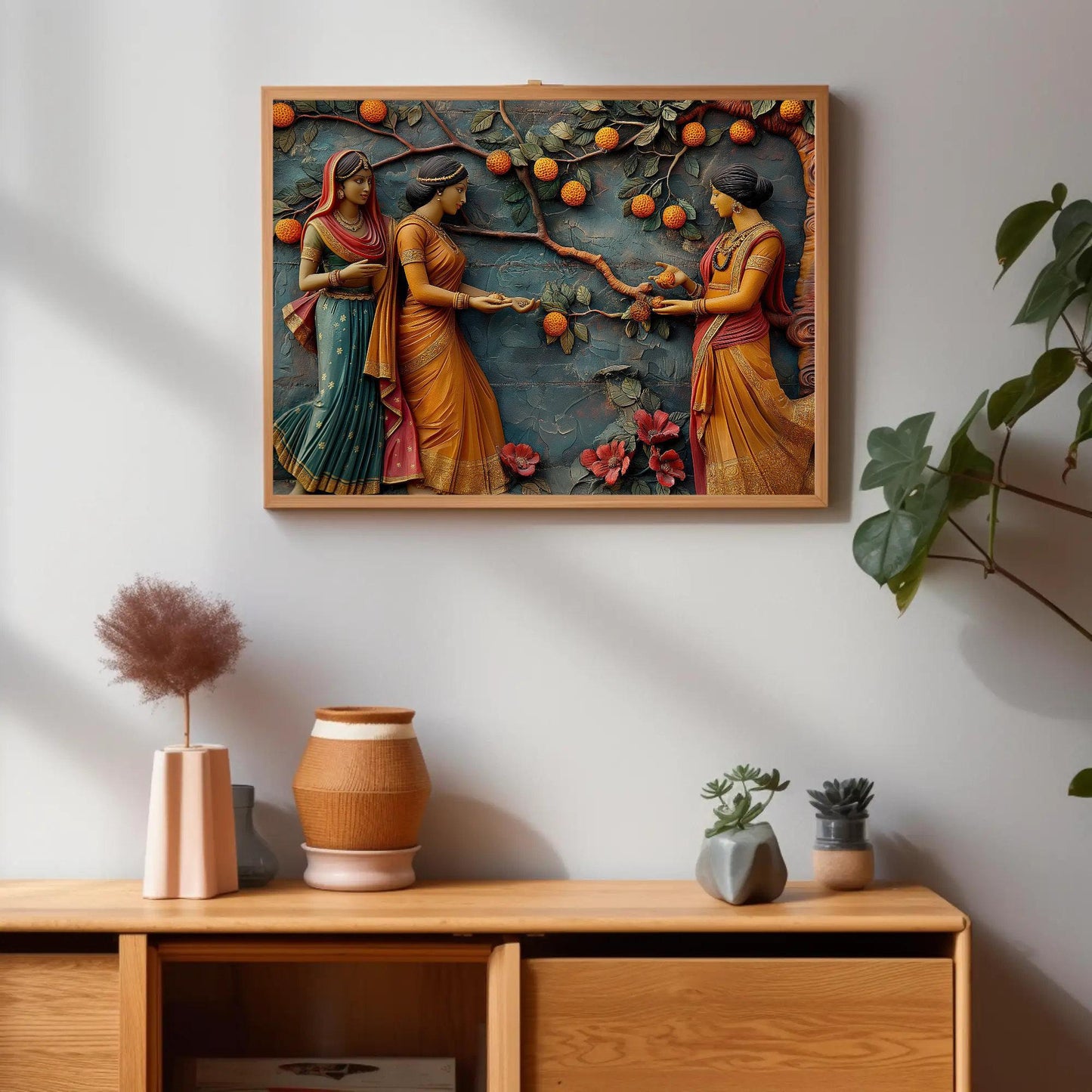 Indian Women canvas wall art shown above a cabinet