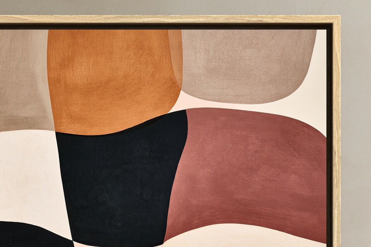 Blush organic shapes abstract canvas wall art, image is a close-up of a framed abstract artwork, featuring a variety of