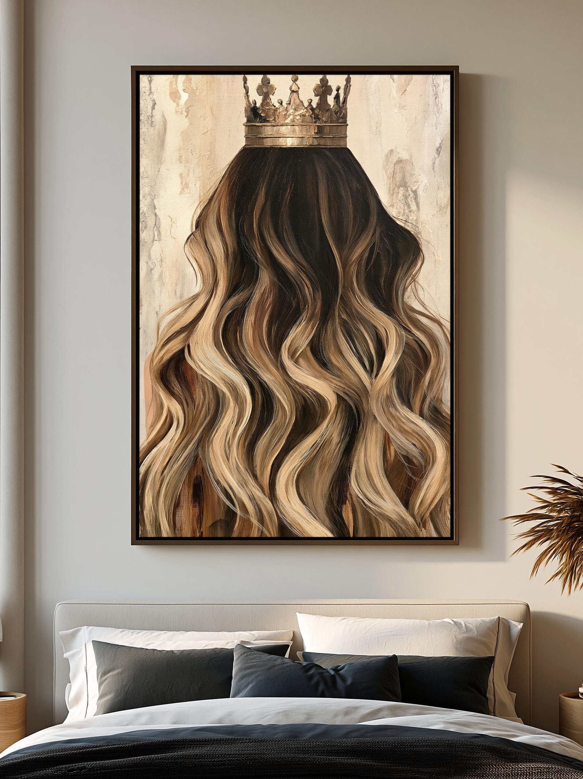a large painting of a woman's long, wavy hair with a crown on top, hanging on a wall above a bed with white pillows.