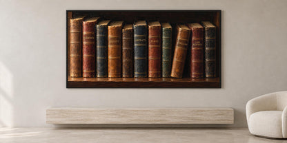 a large framed painting of a row of old books on a shelf, hanging on a wall in a room.