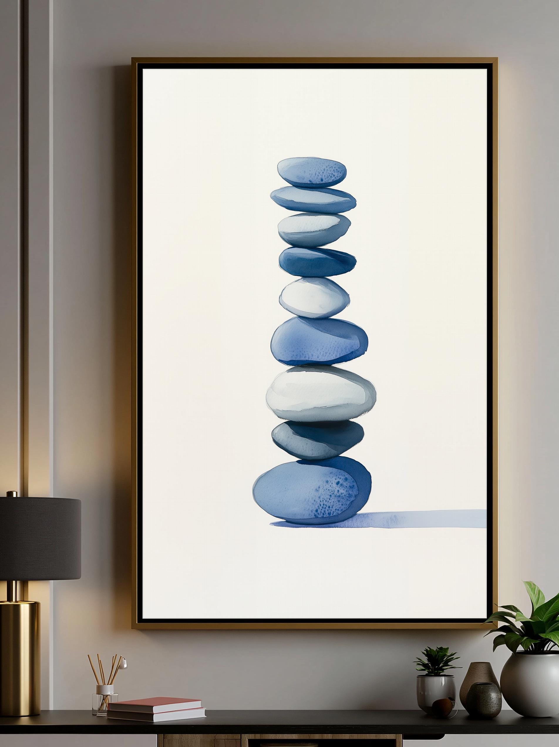 a large framed painting of blue and white stones stacked on top of each other, creating a visually striking composition.
