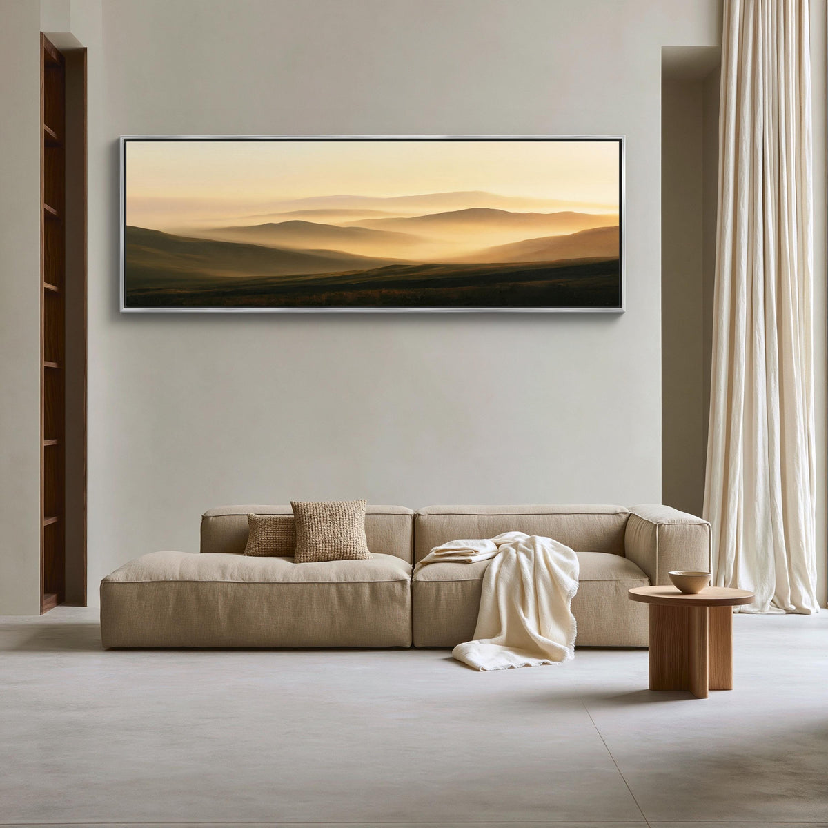 Golden hour rolling hills canvas wall art, large, beige sofa with a white blanket draped over it, positioned in front of a