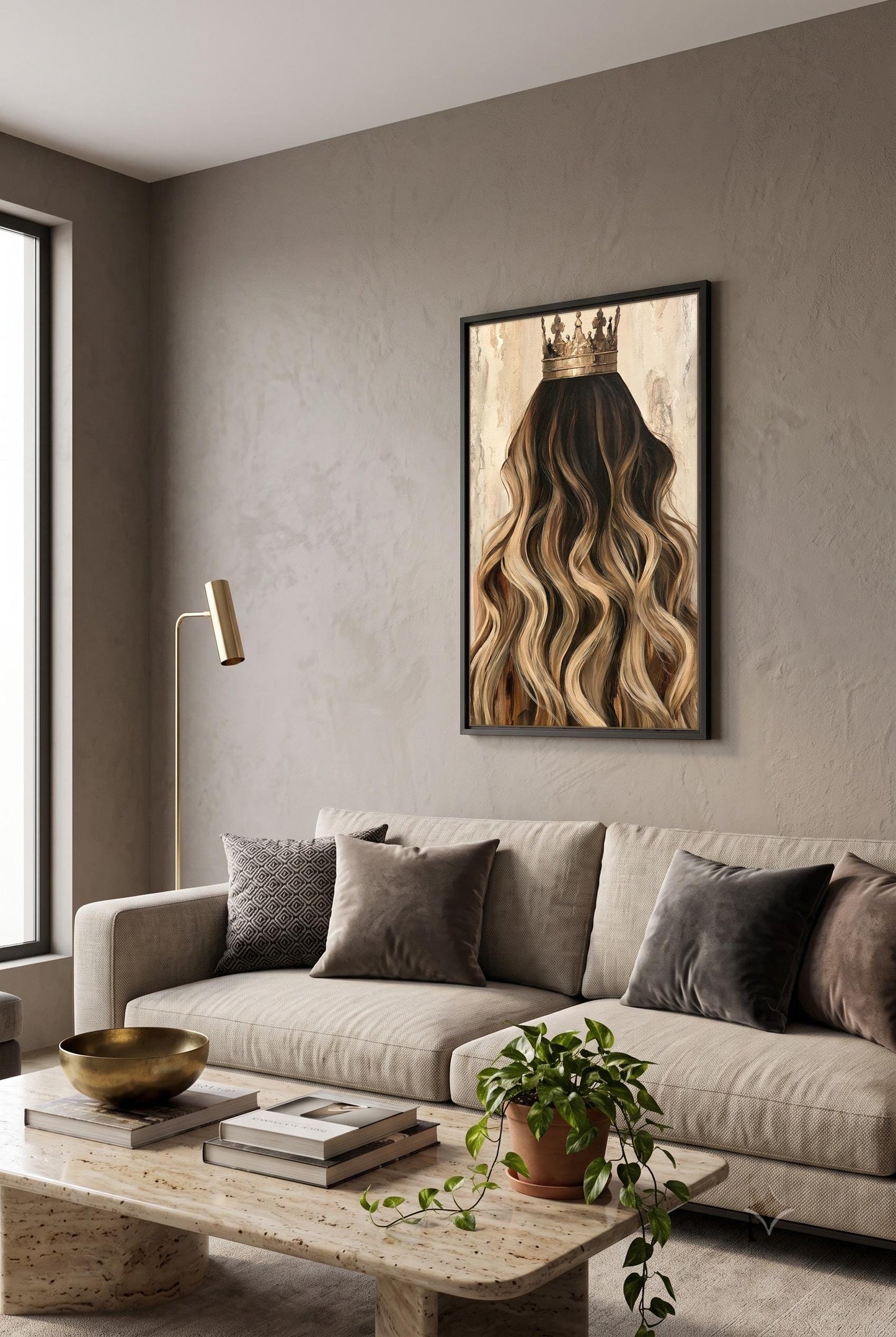 a modern living room with a large framed artwork of a woman's long, wavy hair with a crown on the wall above a beige sofa. The sofa is adorned with several throw pillows, and there is a wooden coffee table in front of it. A potted plant is placed on the floor, and a lamp is situated on a side table.