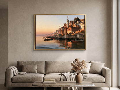 a large framed painting of a serene waterfront scene with boats and buildings reflected in the water, hanging on a wall above a beige sofa in a living room.