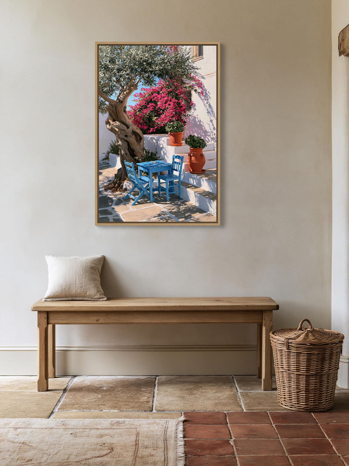 Greek taverna courtyard canvas wall art, cozy outdoor seating area with a wooden bench, a wicker basket, and a blue chair