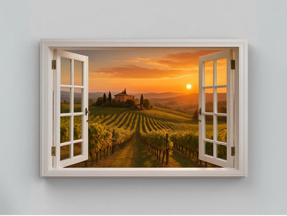 a window view of a vineyard at sunset