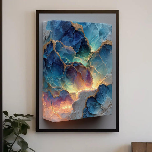a painting hanging on a wall next to a potted plant