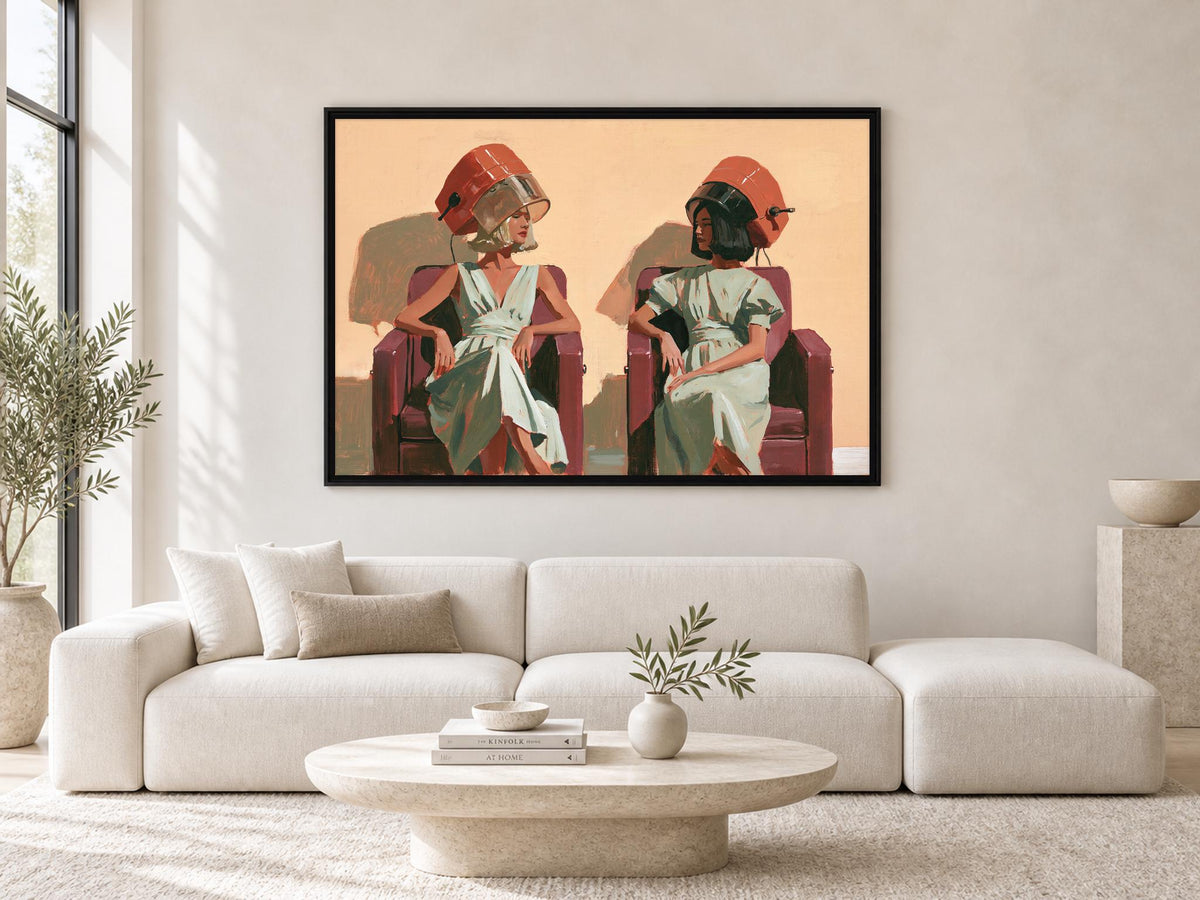 a large framed painting of two women sitting in chairs, with one woman wearing a red hat and the other wearing a green hat. The painting is displayed on a wall above a white sofa in a modern living room setting.