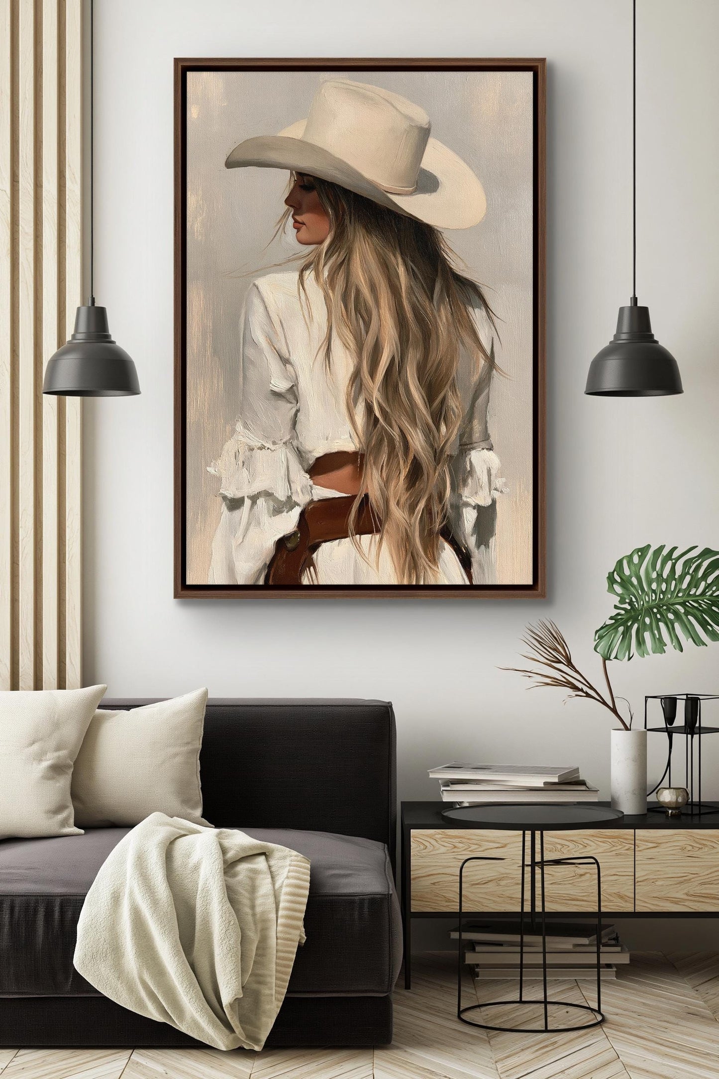 a woman with long blonde hair wearing a cowboy hat, standing in a room with a black couch, a coffee table, and a plant.