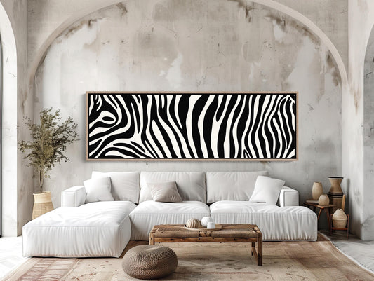 a living room with a zebra print on the wall