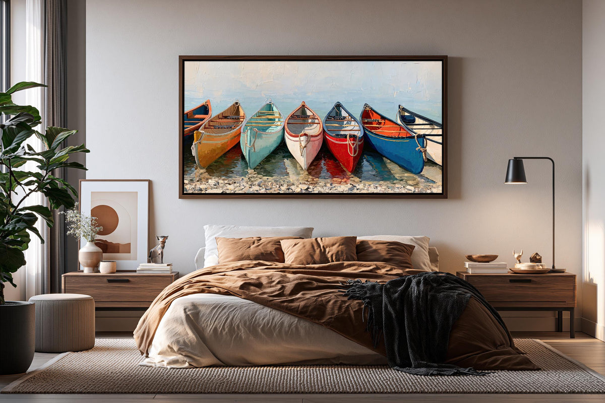 a bedroom with a large framed picture of colorful boats on the wall above a bed.