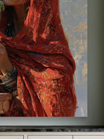 Rajasthani woman with parakeet canvas wall art, image is a close-up of a vibrant red fabric, possibly a shawl or robe, with