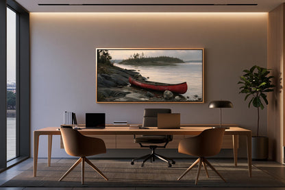a modern office space with a large window overlooking a scenic lake. The office features a wooden desk with a laptop, a comfortable chair, and a framed painting of a red canoe on the wall.