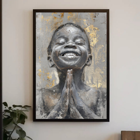 The image is a framed painting depicting a smiling young person with their hands clasped together in a praying position.