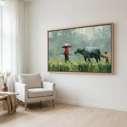 a large painting of a person walking with an umbrella and a cow in a field, hanging on a white wall in a living room.