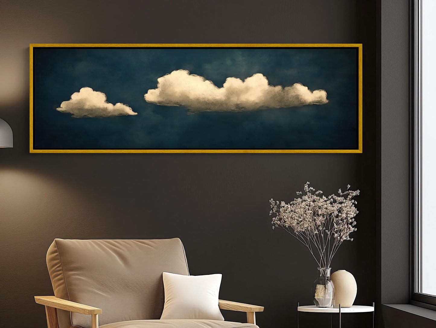 a living room with a couch and a painting on the wall