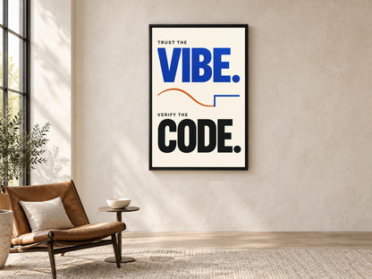 a poster with the text "Trust the VIBE. Verify the CODE." hanging on a wall in a room with a brown leather chair and a small side table.