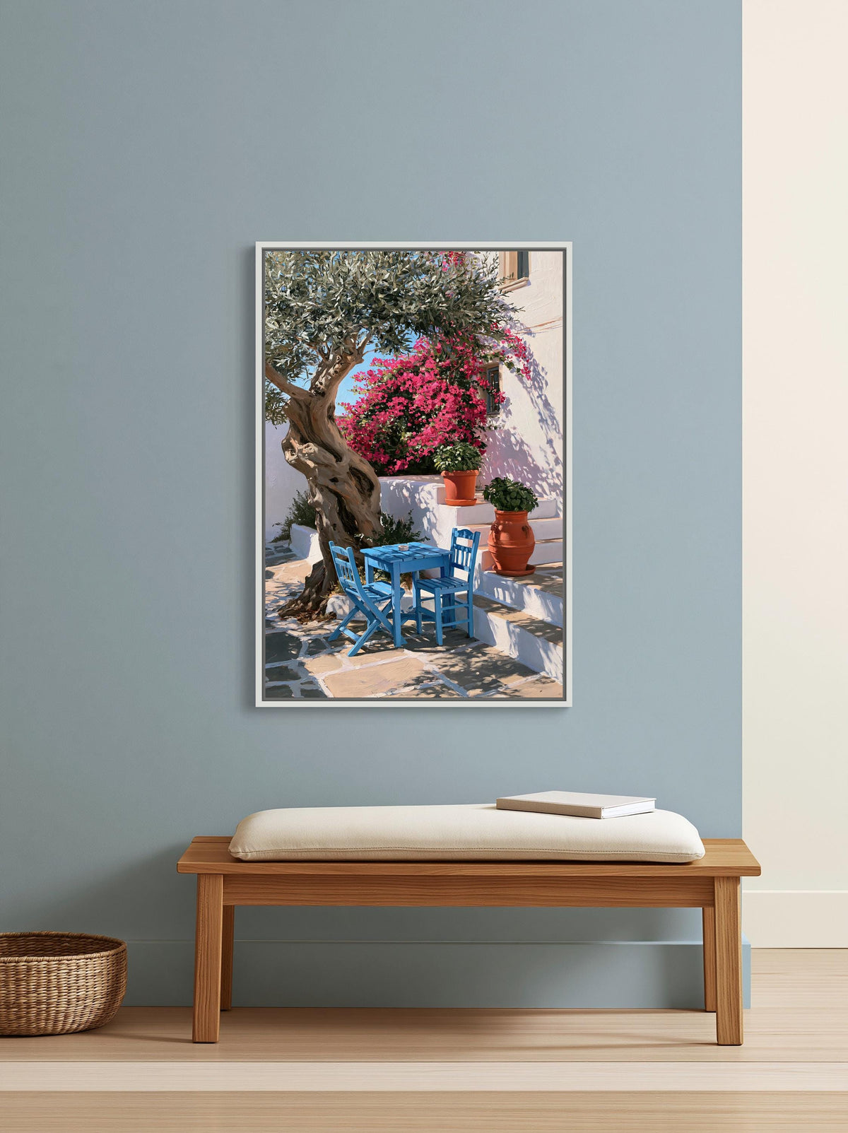 Greek taverna courtyard canvas wall art, blue bench with a white cushion, positioned in front of a framed picture depicting