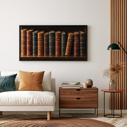a cozy living room with a white sofa, a wooden side table, and a framed artwork of old books on a shelf above the sofa.
