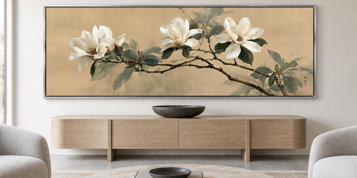 a large painting of white flowers on a wooden cabinet, which is placed above a wooden entertainment center in a living room setting.