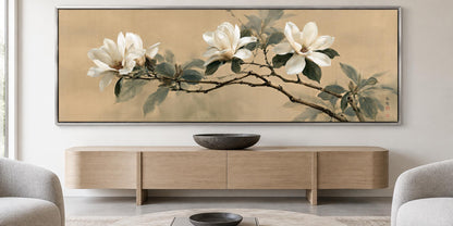 a large painting of white flowers on a wooden cabinet, which is placed above a wooden entertainment center in a living room setting.