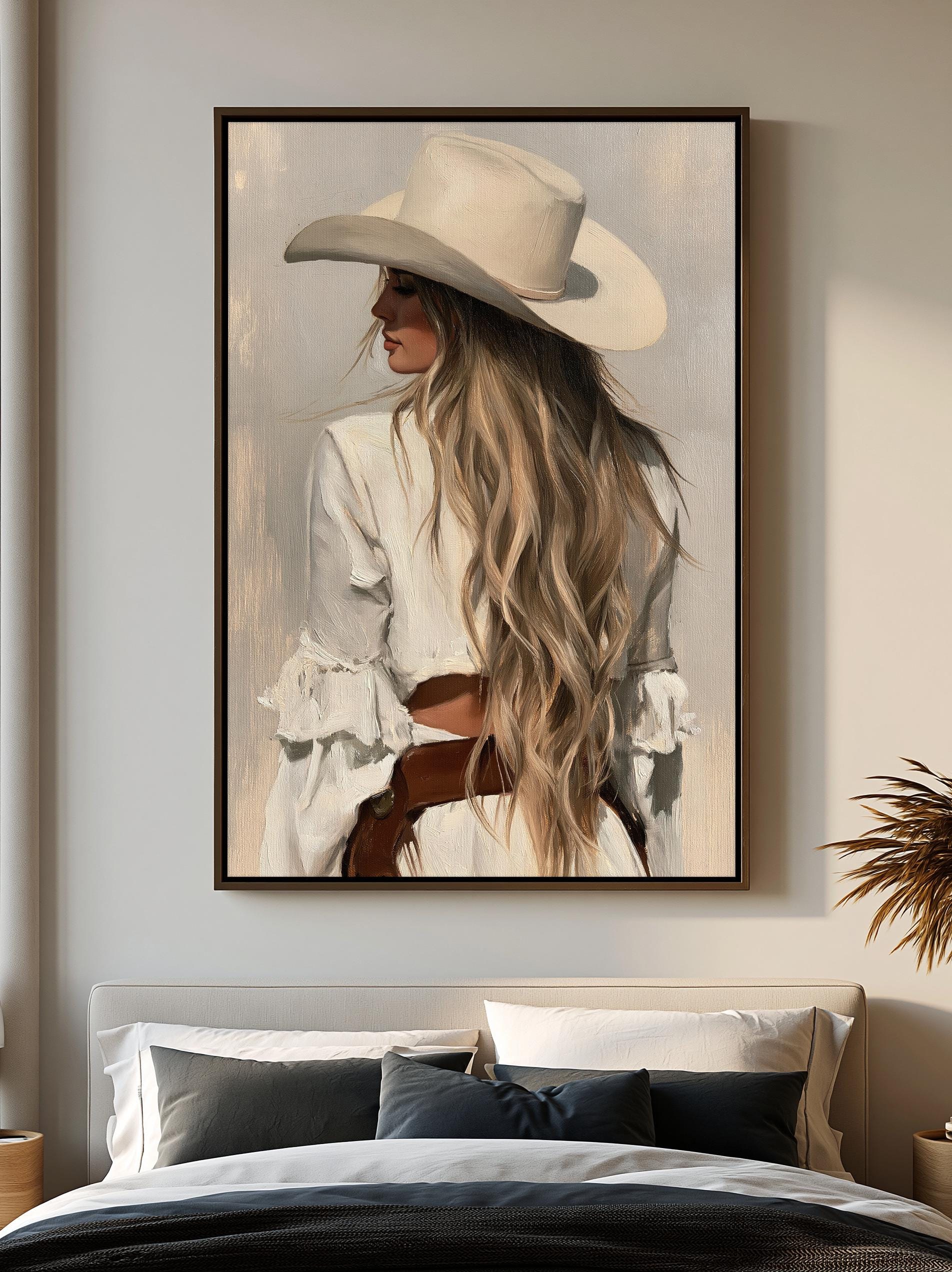 a large framed painting of a woman with long blonde hair wearing a cowboy hat, standing in a contemplative pose.