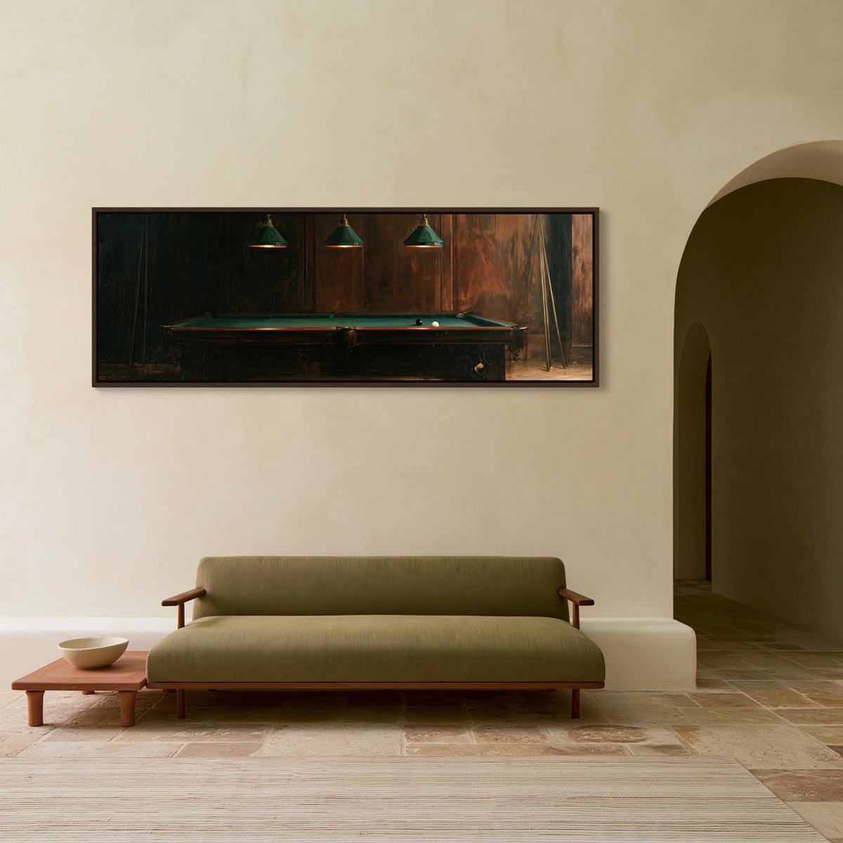 Billiard table under lamps canvas wall art, cozy living room with a green sofa and a wooden coffee table. Above the sofa